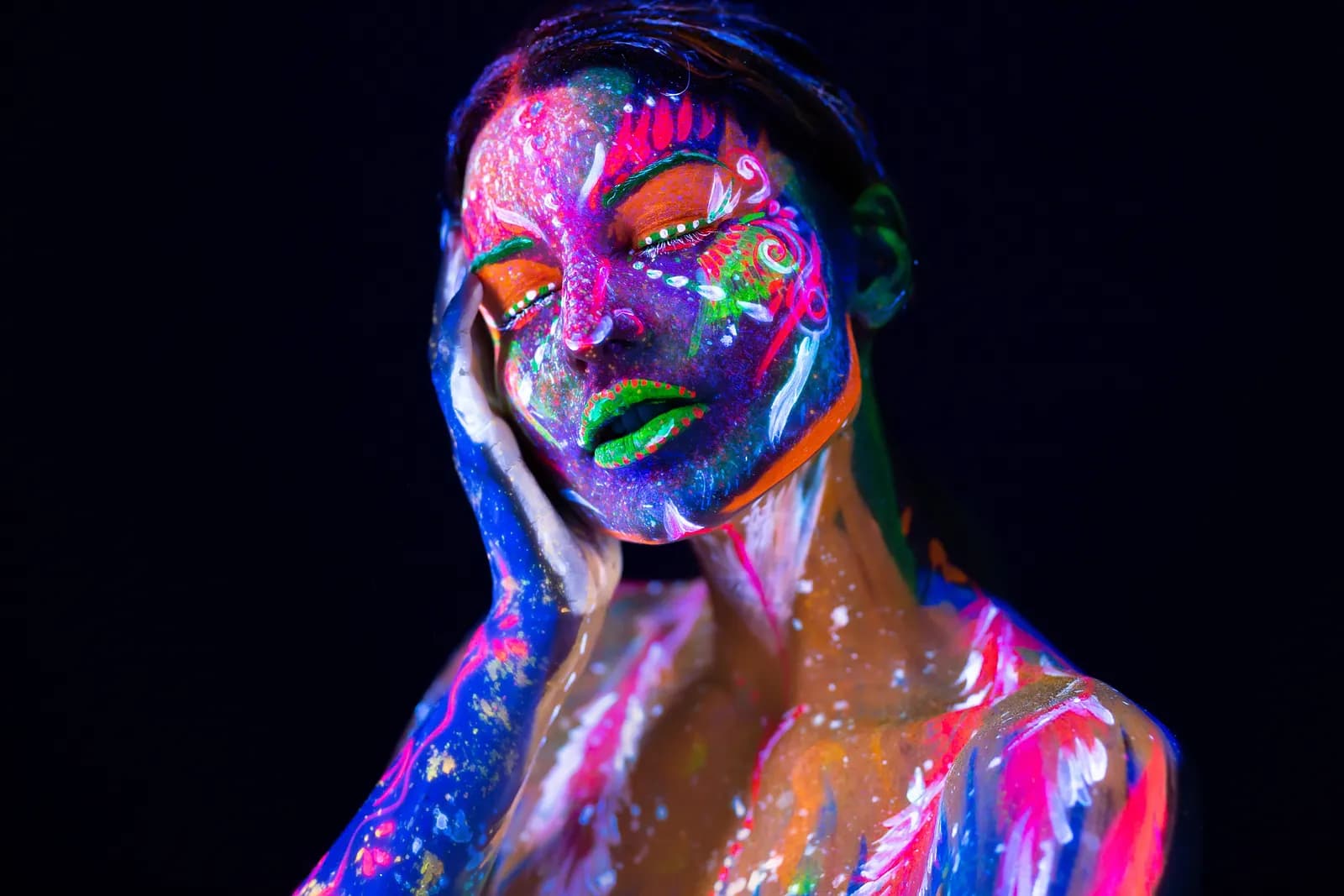 Face with glowing neon makeup